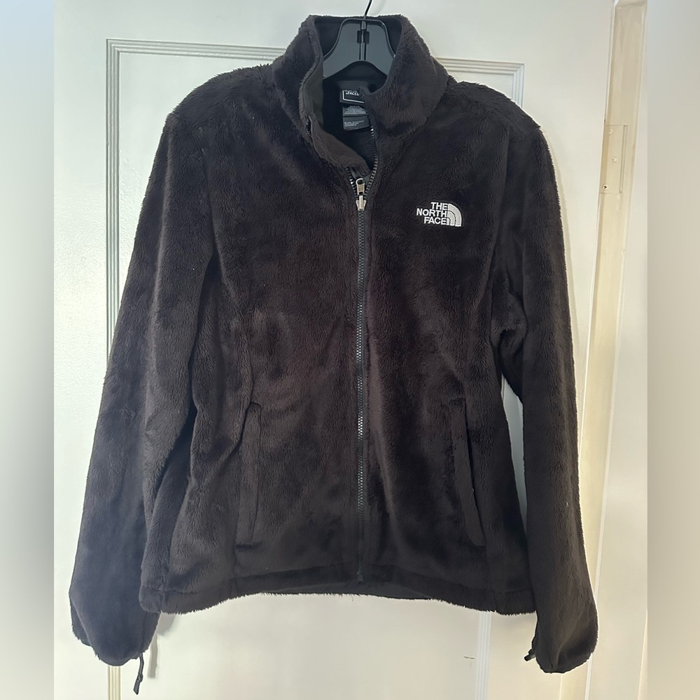 The North Face (women) zip up sweater in black, size medium